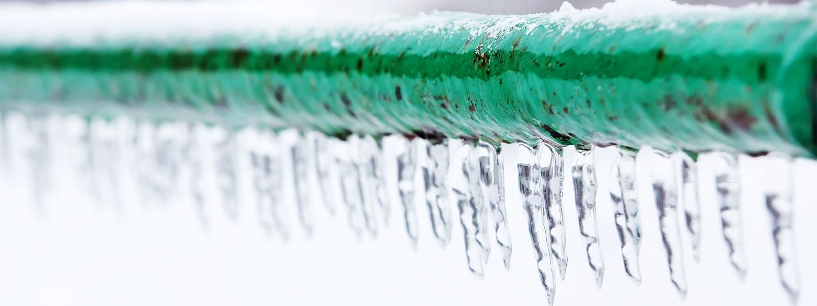 frozen pipe with icicles