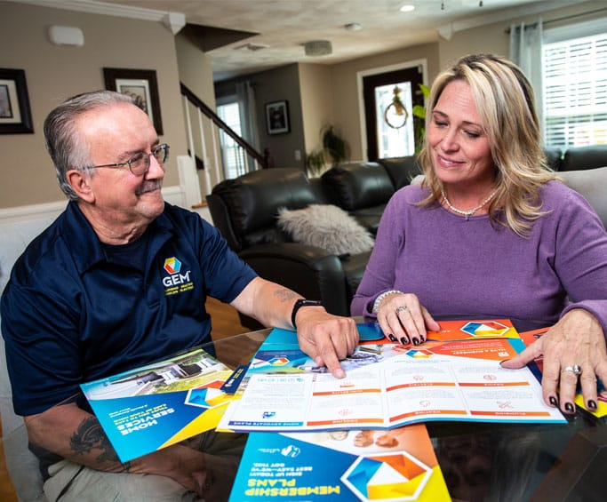 GEM Technician Explaining Plans to Customer