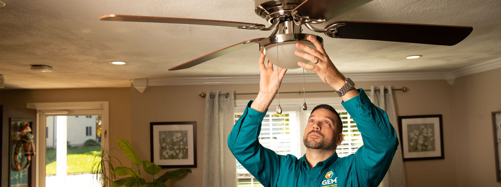 Technician Repairing a Light