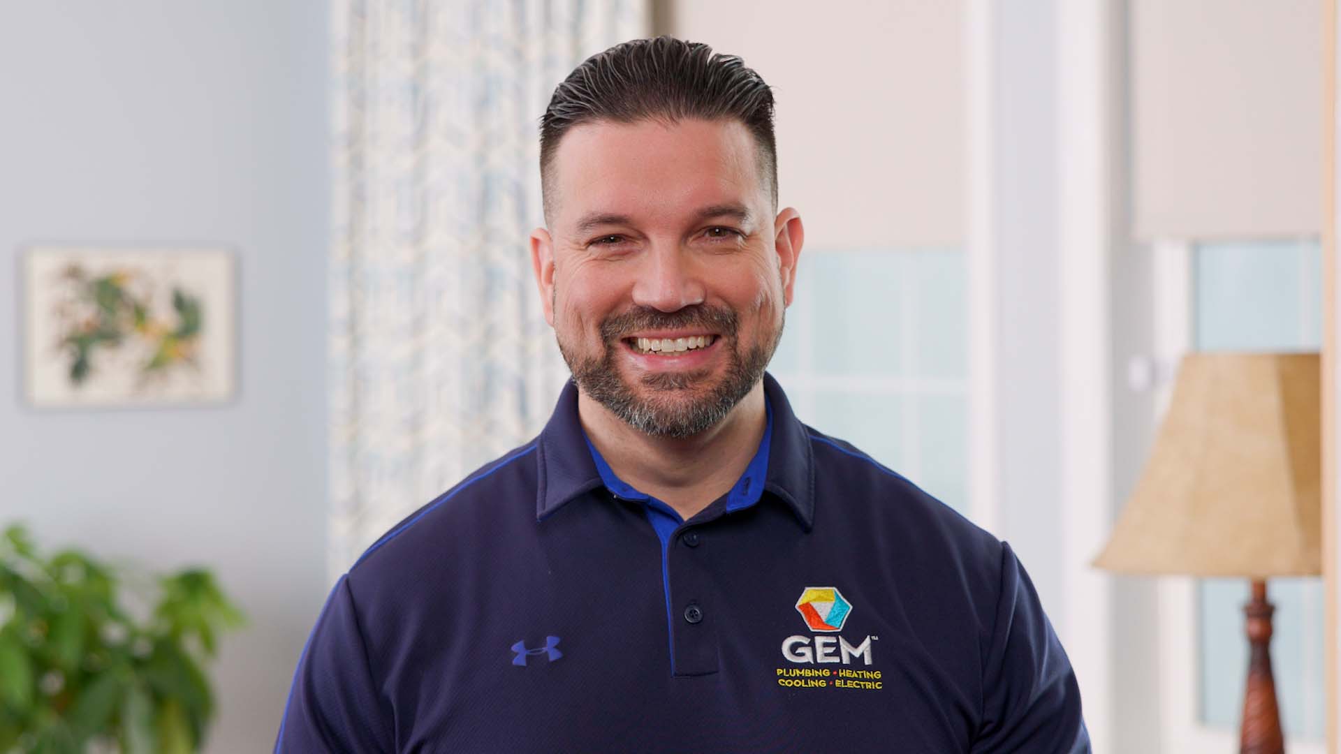 Smiling GEM Plumbing & Heating technician