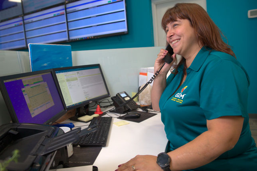 GEM customer service representative on the phone and talking about how HVAC rebates work.