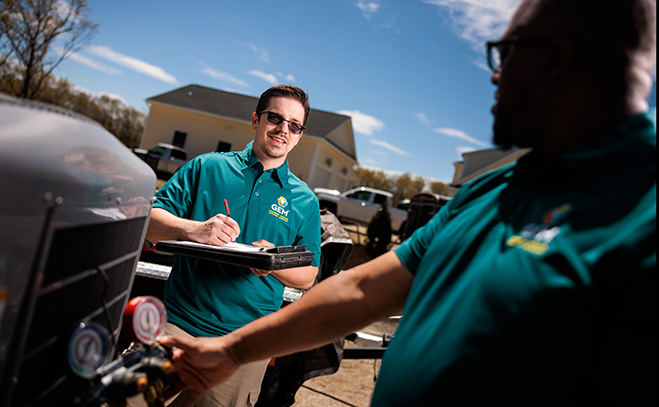 GEM technician performing AC maintenance