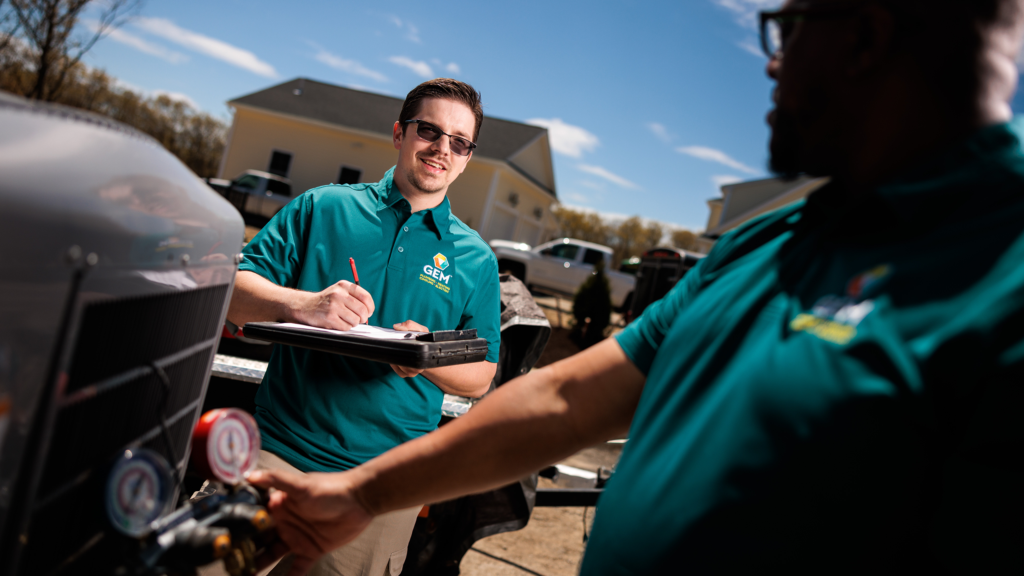 GEM technician performing in-home HVAC service consultation