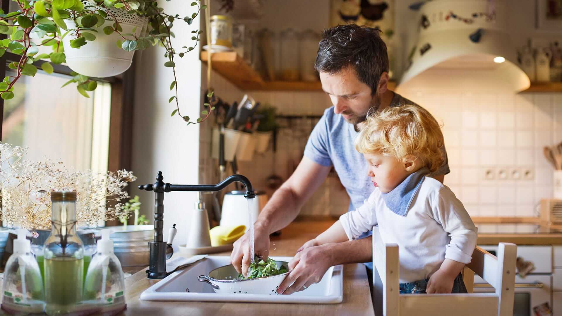 Family Using Recently Repaired Sink