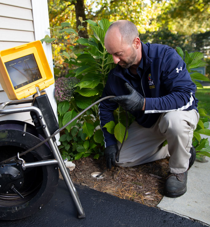 GEM plumber cleaning a sewer line