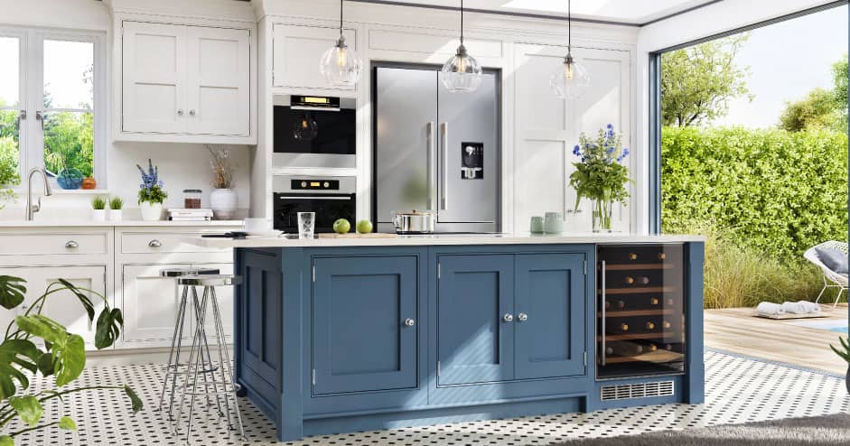 Clean kitchen with navy cabinets and stainless appliances