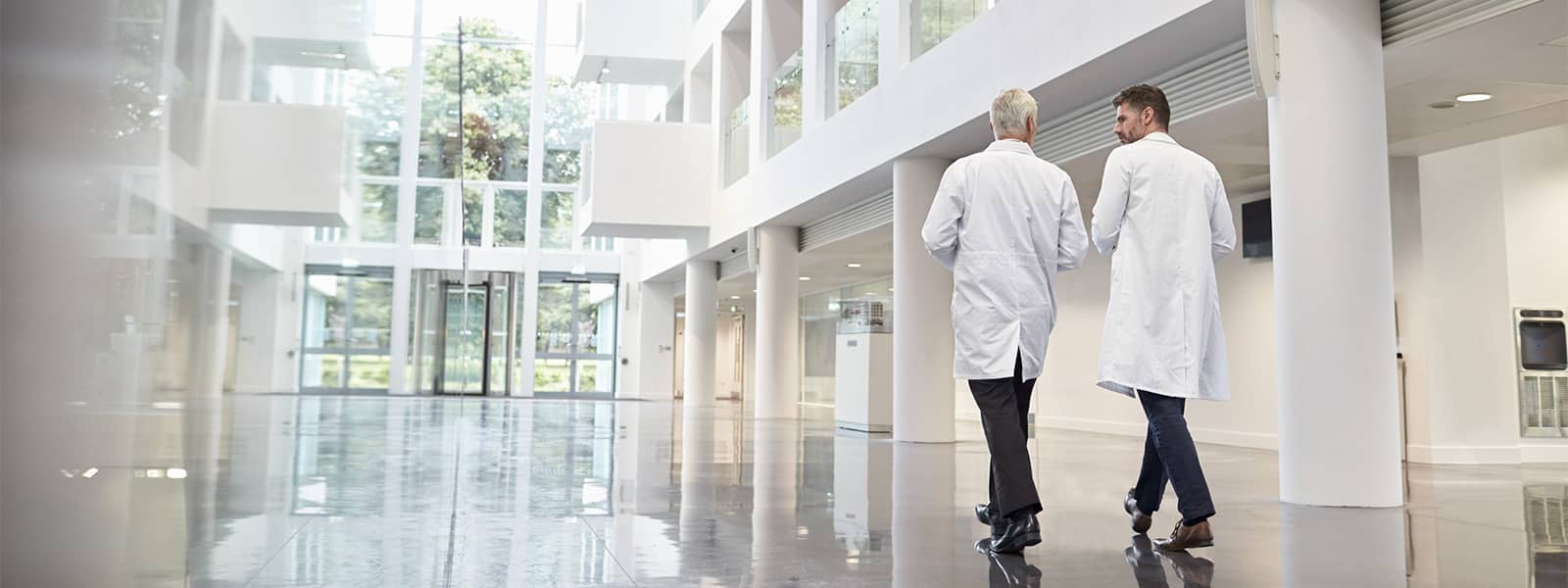 Doctors walking in medical center