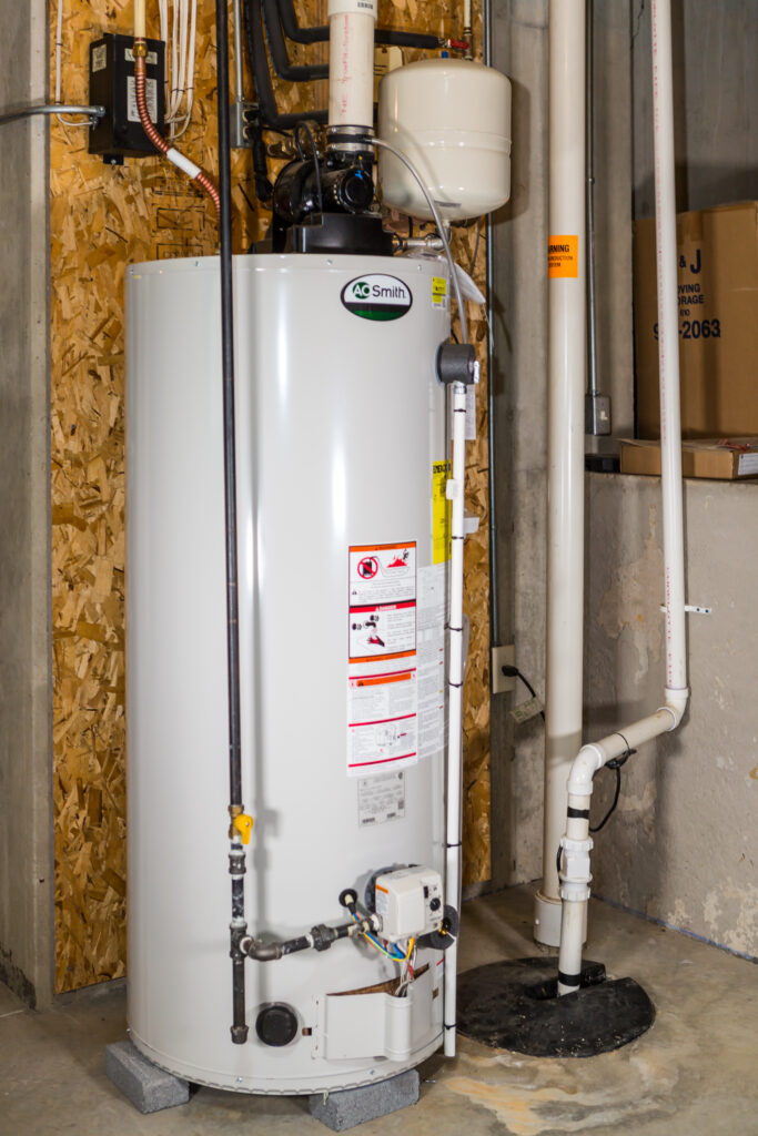close up on residential water heater in basement